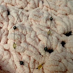 Silpada wire necklace with green pearls and yellow beads